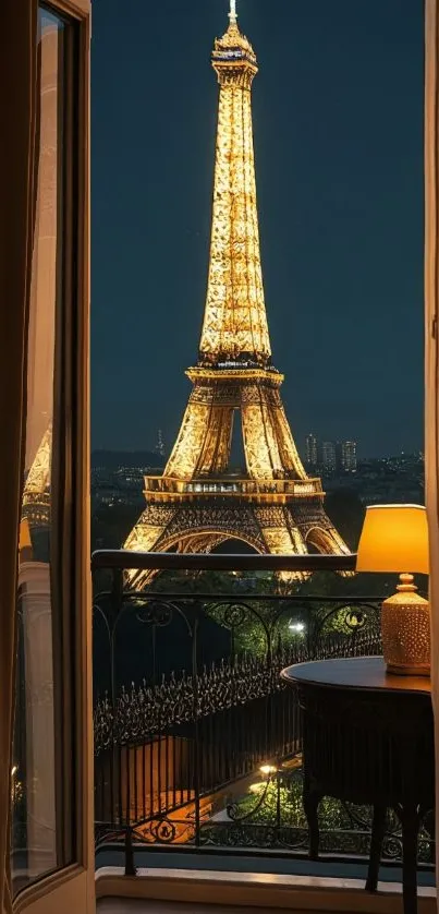 Night view of the Eiffel Tower glowing from a Parisian balcony.