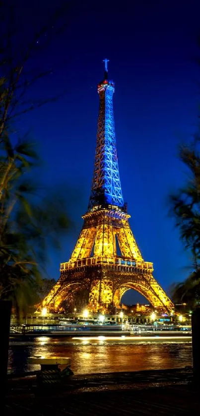Eiffel Tower glowing beautifully at night in Paris.