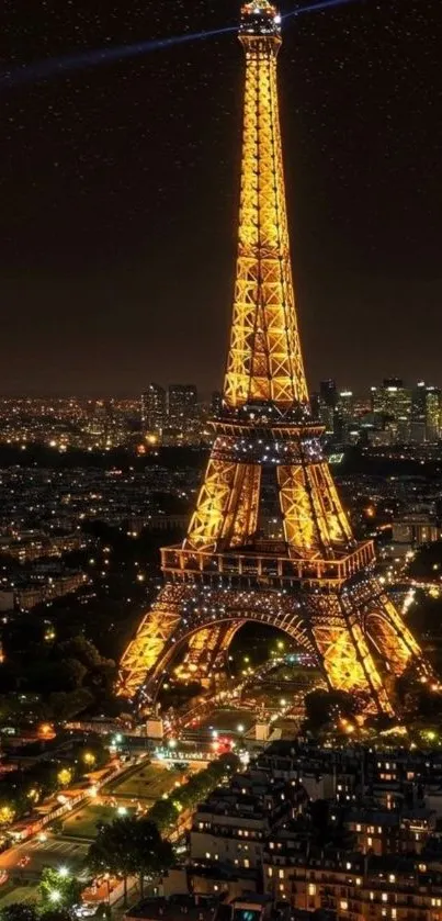 Eiffel Tower brightly lit at night in Paris.