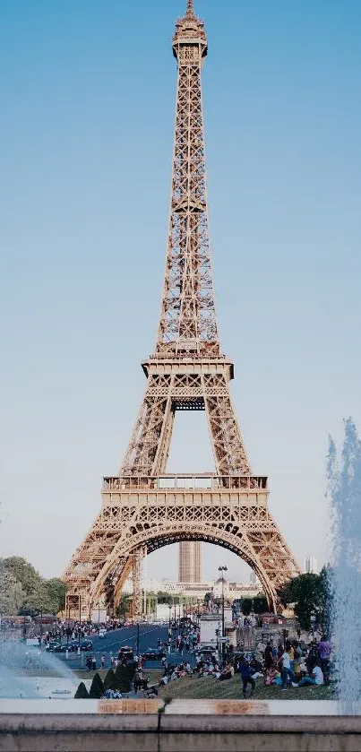 Eiffel Tower with fountains and blue sky mobile wallpaper.