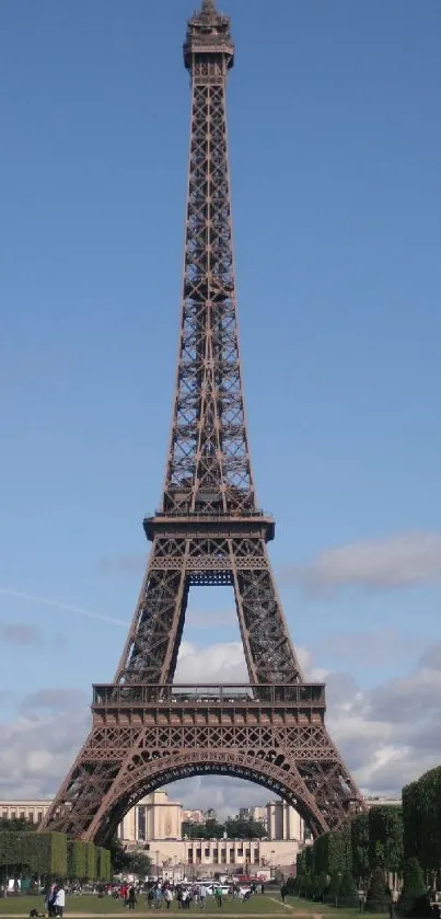 A stunning view of the Eiffel Tower against a bright blue sky.