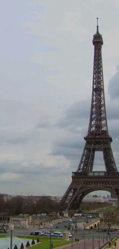 Scenic view of the Eiffel Tower against a cloudy sky in Paris.