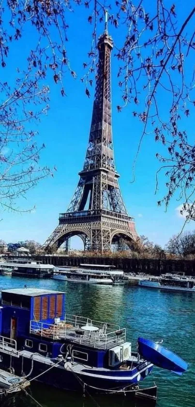 Eiffel Tower with blue sky and river view mobile wallpaper.