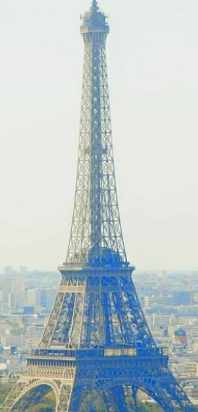 Scenic mobile wallpaper of Eiffel Tower in hazy Paris cityscape.