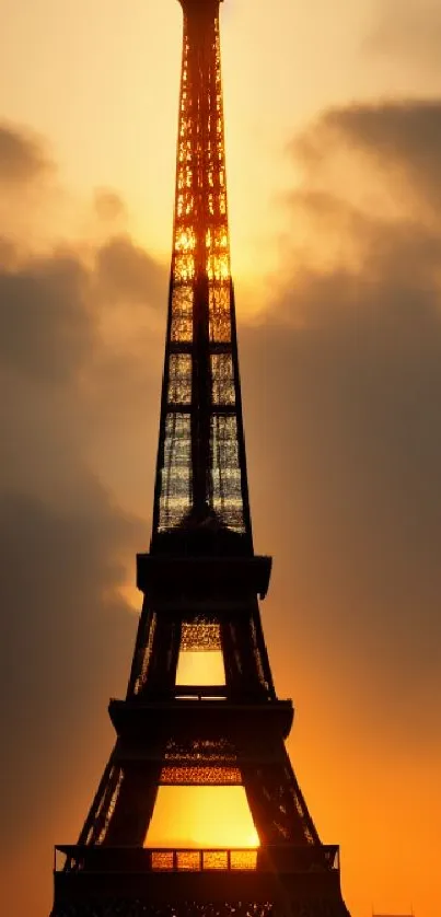 Eiffel Tower silhouette under a vibrant sunset sky.