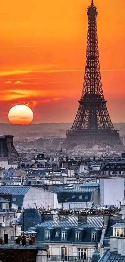 Eiffel Tower silhouetted by a vibrant orange sunset in Paris.