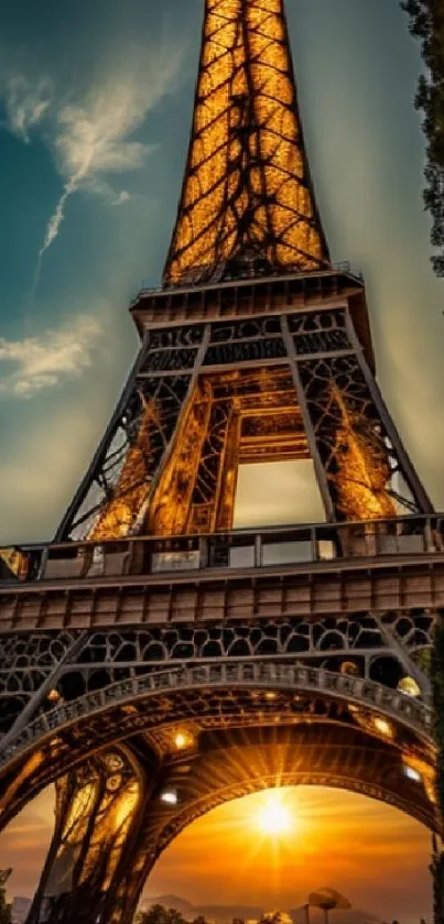 Eiffel Tower at sunset with vibrant sky.