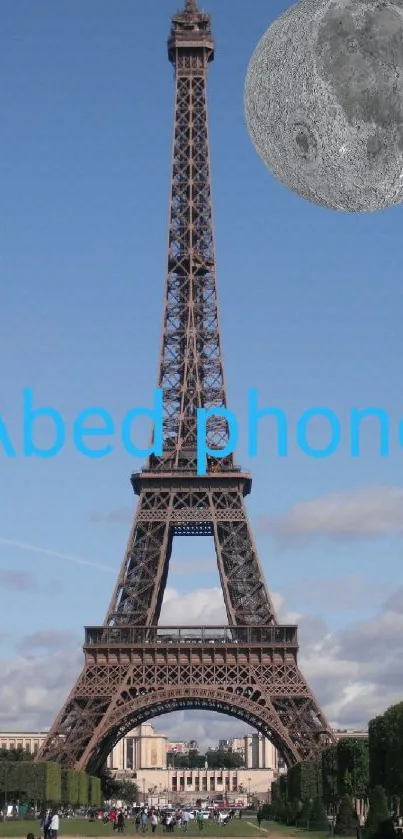 Eiffel Tower with moon against blue sky wallpaper.