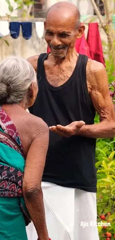 Elderly couple sharing a joyful moment in a lush garden.