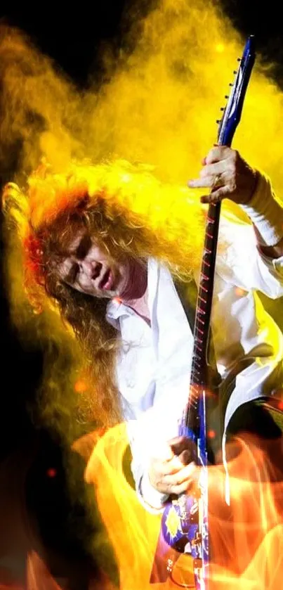 Energetic guitarist playing on stage with yellow lighting.