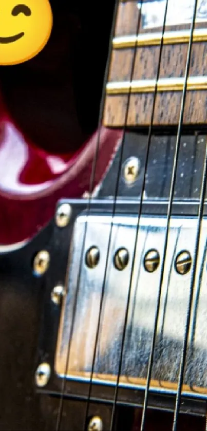 Electric guitar wallpaper with emoji on dark background.