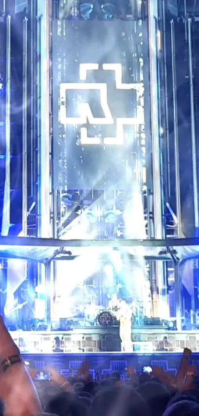 Vibrant concert stage featuring blue lights with energetic crowd scene.