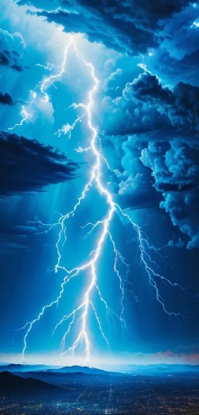 Electrifying lightning strike in a vivid blue storm sky over a cityscape.