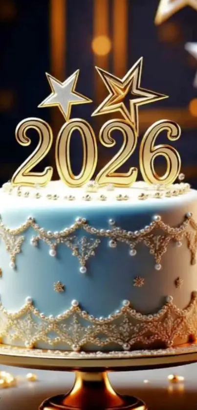 2026 celebration cake with gold stars and blue icing.