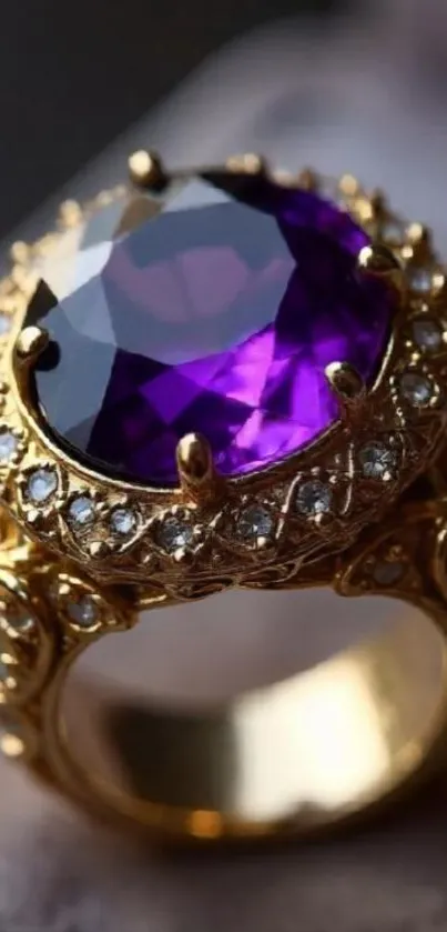 Gold ring with a large purple amethyst gemstone.