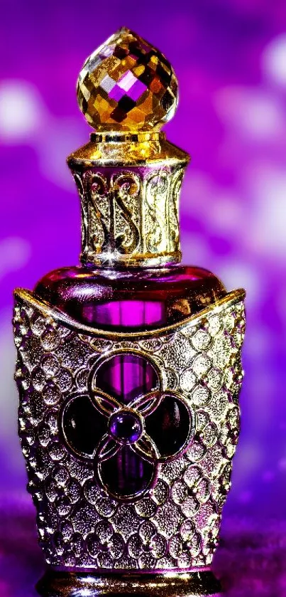 Antique perfume bottle with gold on purple background.