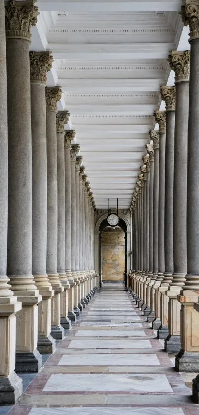 Elegant stone columns with a white ceiling create a timeless architectural passage.