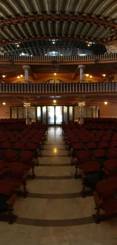 Elegant interior of a grand hall with ornate ceiling and rows of chairs.