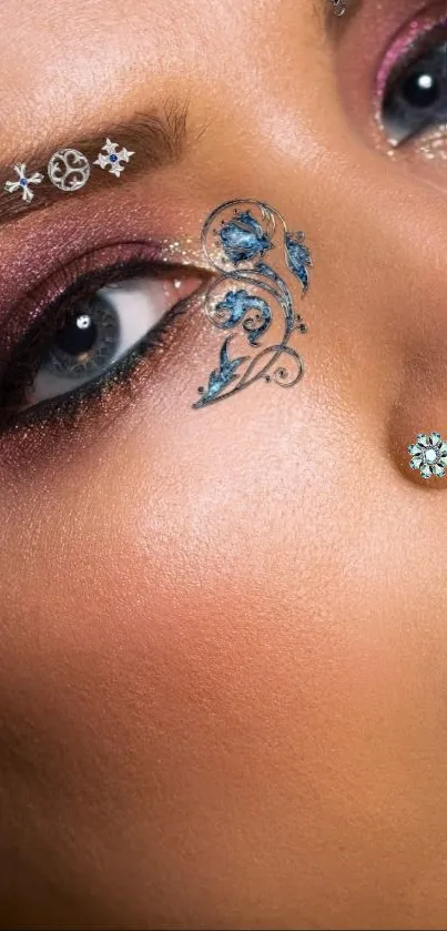 Artistic face with blue design and intricate makeup. Elegant and fashionable.