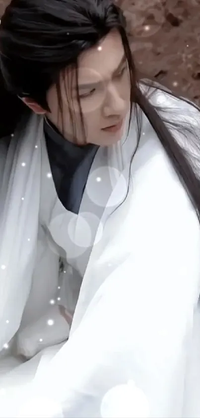 Elegant Asian character with long black hair in a white robe sitting outside.