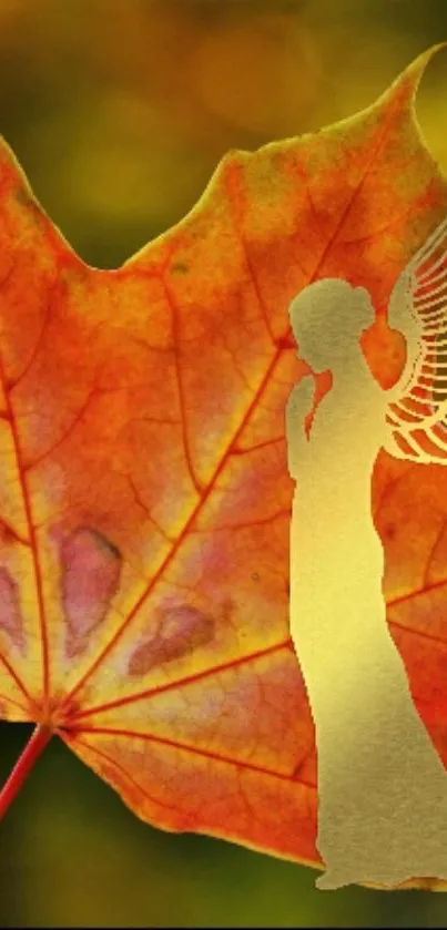 Autumn leaf with golden angel silhouette wallpaper.