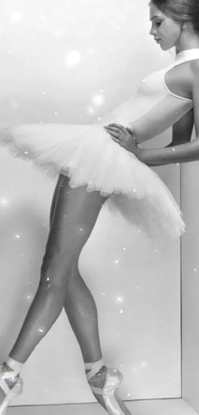 Monochrome image of a ballerina in elegant profile pose.