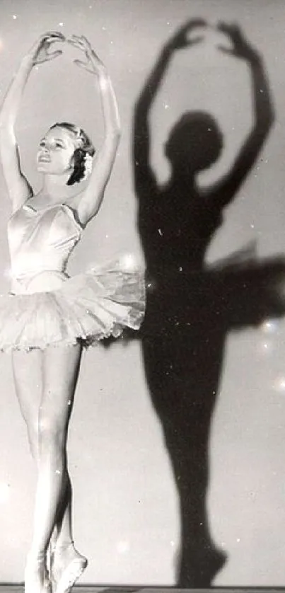 Black and white photo of a ballerina with elegant shadow.