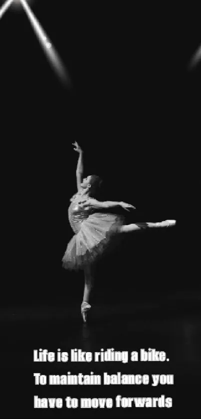 Ballet dancer with motivational quote on black background.