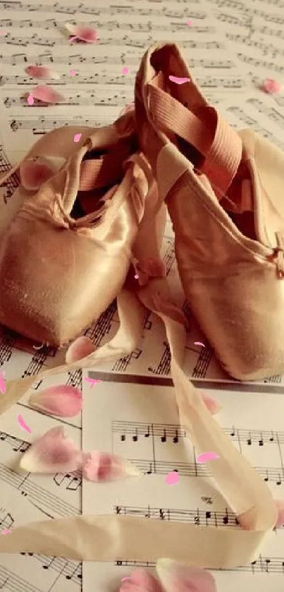 Elegant ballet shoes on music sheets with petals scattered.