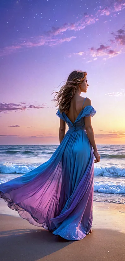 Woman in blue dress on a beach at sunset.