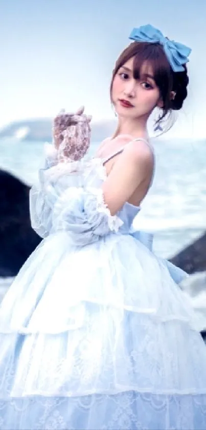 Young woman in white dress by the sea.