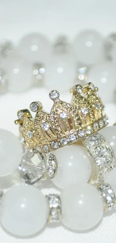 White beaded bracelet with crown design on a clear background.