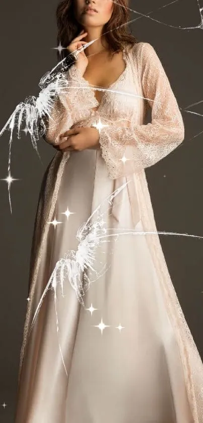 Woman in flowing beige dress posing elegantly against brown background.