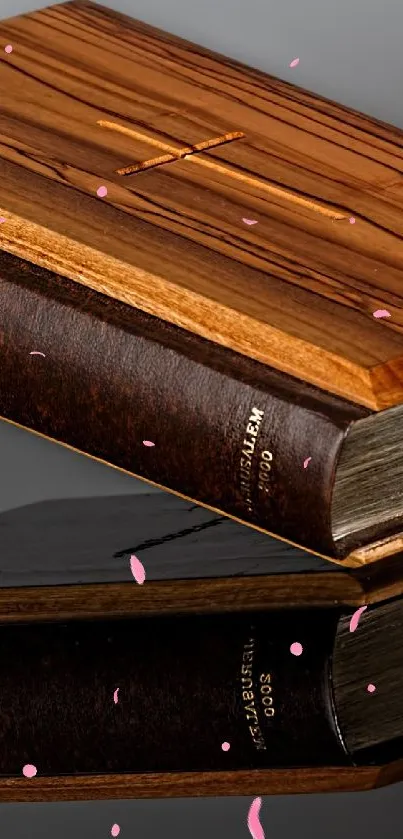 Elegant brown Bible with wooden texture on a reflective surface.