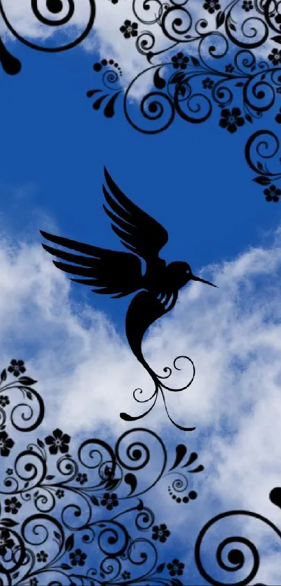 Elegant bird silhouette with floral patterns against a blue sky and clouds.