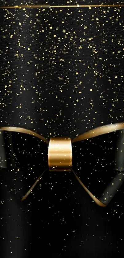 Elegant golden bow with sparkles on black background wallpaper.