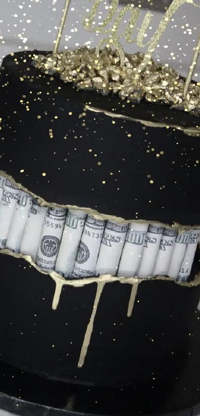 Black cake with gold accents and dollar bills on a marble surface.