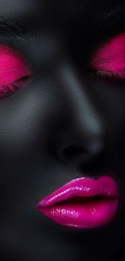 Matte black face with vivid pink makeup, striking elegance.