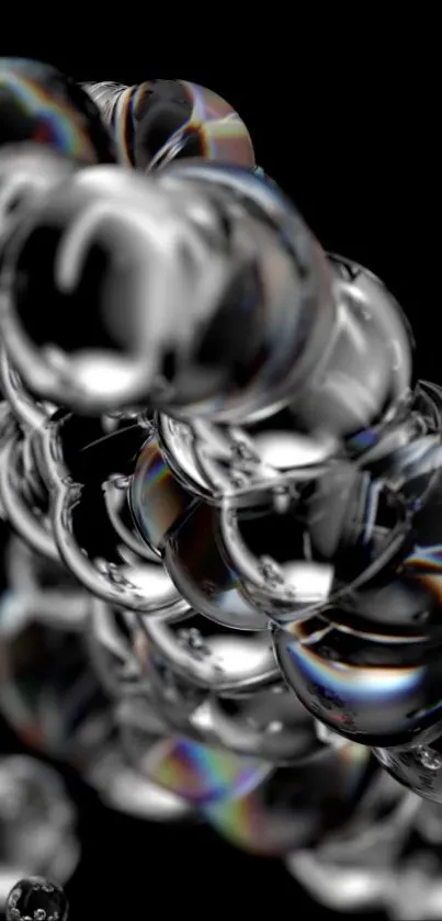 Elegant black and silver orbs design with reflective effects for mobile wallpaper.