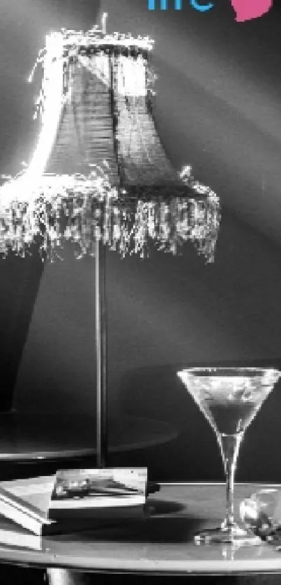 Black and white wallpaper with lamp and cocktail glass.