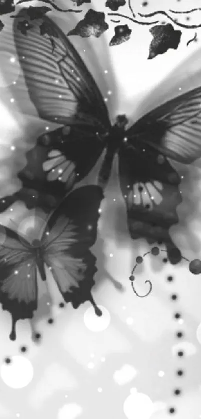 Elegant black butterflies with floral accents on a monochrome wallpaper.