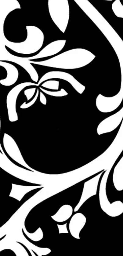 Elegant black and white floral pattern wallpaper.