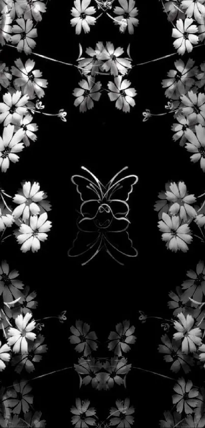 Black floral wallpaper with white blossoms and symmetrical design.