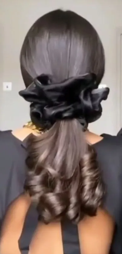 Chic black hair accessory with elegant style.