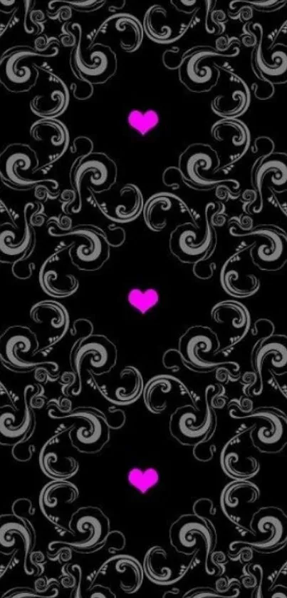 Black wallpaper with pink hearts and intricate swirls.