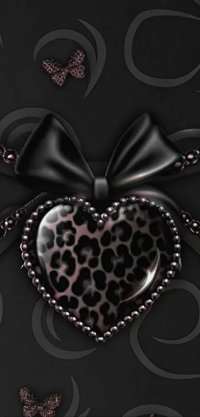 Elegant black heart wallpaper with ribbons and leopard pattern.
