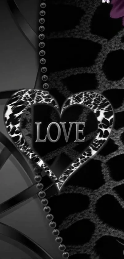 Elegant black and silver heart wallpaper with floral accents.