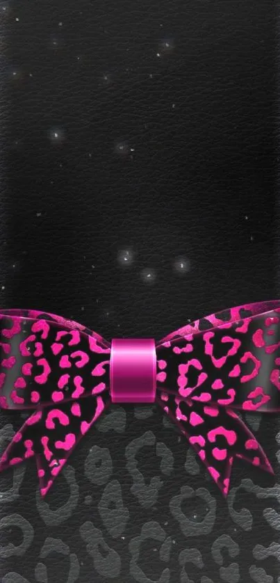 Black wallpaper with pink leopard bow accent.