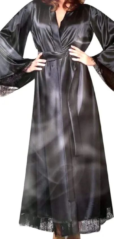 Elegant black satin robe with flared sleeves and lace trim.