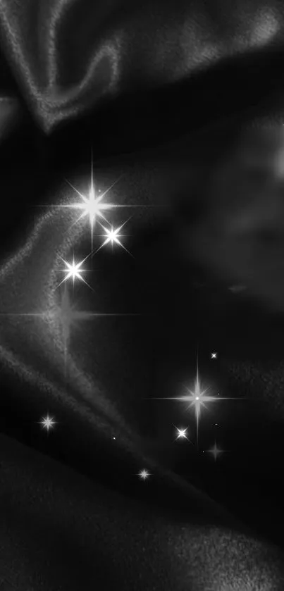 Elegant black wallpaper with shining stars.